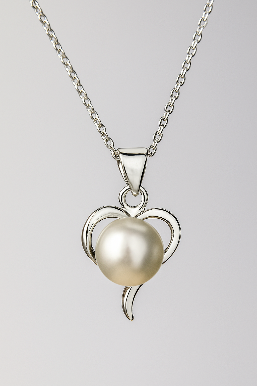 Silver Petal with a Pearl Heart Pendant